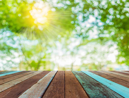 wood table and Bokeh of tree.の写真素材
