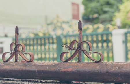 vintage tone image of old iron sharp tip on fence.の写真素材