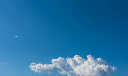 image of blue sky and white clouds on day time for background usage.の写真素材