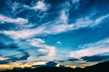 silhouette shot image of mountain and sunset sky in background.の写真素材