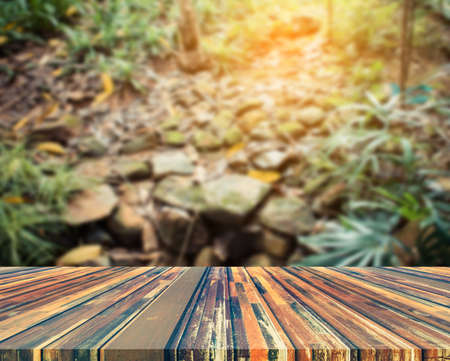 blur image of wood table and  Abstract Bokeh of tree green color background .の写真素材