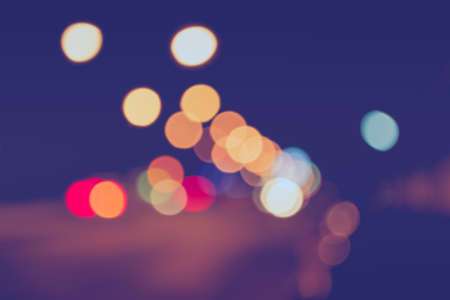image of blur street bokeh with lights in night time for background usage .