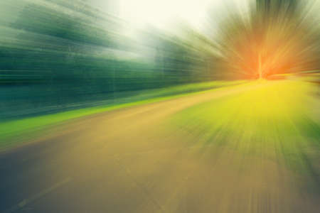 Image of Abstract blur road with motion on day time for background usage . (vintage tone)の写真素材