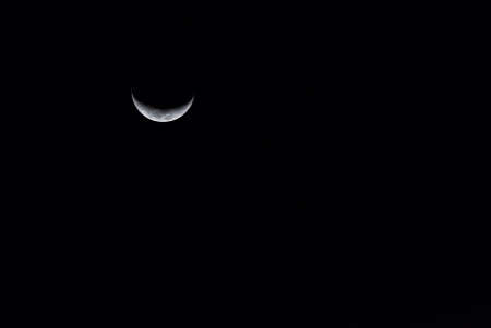 image of waxing crescent Moon with clear sky.の写真素材