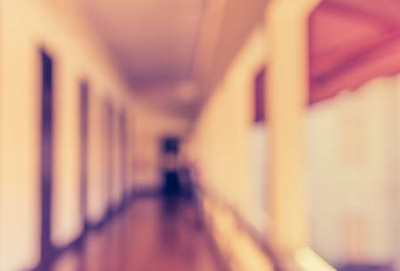 vintage tone image of blur empty long corridor for background usage .の写真素材