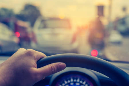 blur image of people driving car on day time for background usage.(take photo from inside)