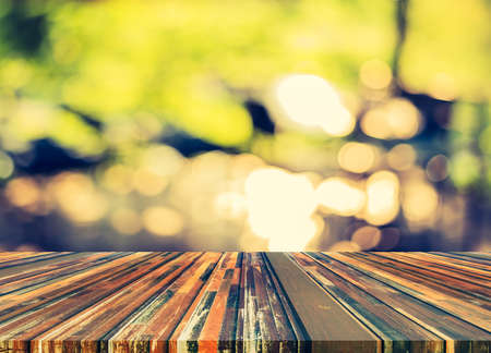 vintage tone blur image of restaurant with bokeh on day time for background usage.の写真素材