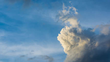 white cumulus clouds in the blue sky for background usage.