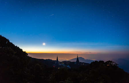 long exposure shot image of stars on mountain at King and Queen Pagodas, Doi Inthanon National Park,Chiangmai Thailand.(high iso photo with high level noise reduction)のeditorial素材