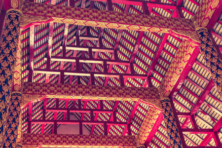 vintage tone image of roof structure in thailand temple.のeditorial素材