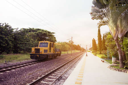 vintage tone image of passenger platform on day time at old railway station.の写真素材