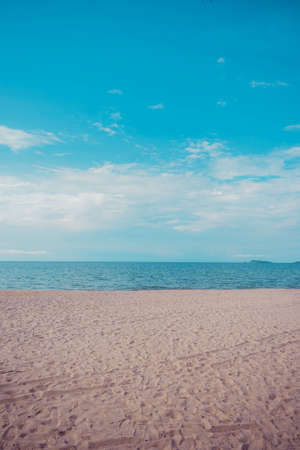 vintage tone of beach and blue sky in background.(vertical)の写真素材