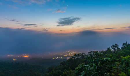 long exposure shot image of Chiang Mai province,Thailand the old city  view from high angle spot night time.の写真素材