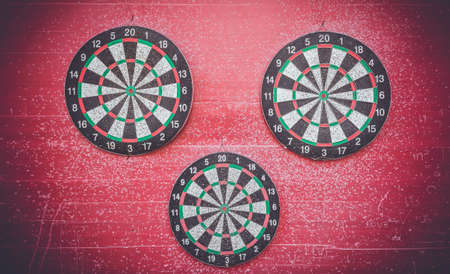 Vintage tone image of empty dart board after hard training.の写真素材