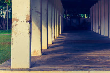 vintage tone image of hall way in Thai temple for background usage.の写真素材