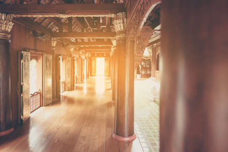 vintage tone image of hall way in Thai temple for background usage.の写真素材