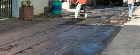 image of  asphalt road fixing on day time.の写真素材