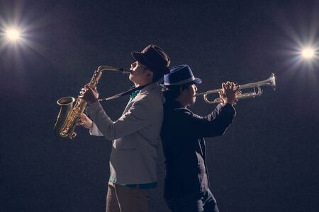 duo musician,saxophone player with trumpet playerの写真素材
