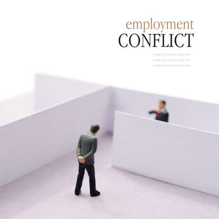 Concept image depicting a situation of employment conflict or tension in the work place. Copy space.の写真素材