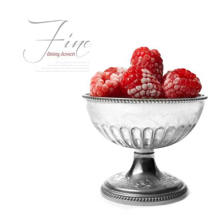 Part of my fine dining series of images  Shallow depth of field macro of frozen raspberries in a silver container against a white background  The perfect image for a classy dessert menu design  Copy space の写真素材