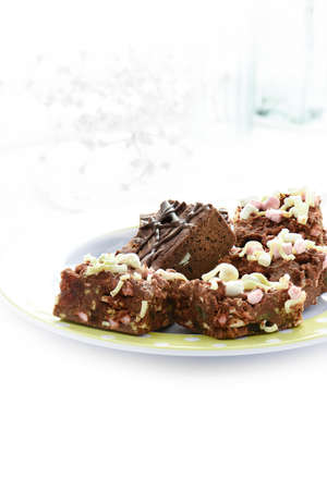 Delicious Rocky Road Belgium chocolate and marsh mellow chunks against white lace. Concept image for wedding favors or desserts. Copy space.の写真素材