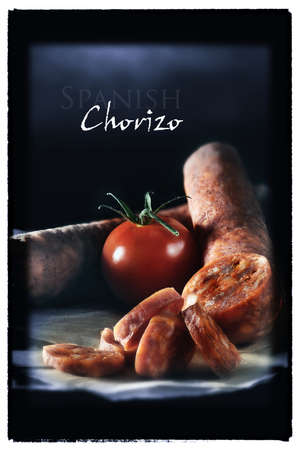 Creatively lit, Spanish Chorizo with selective focus. A different style of image for your bistro or restaurant menu cover art. Generous accommodation for copy space.の写真素材