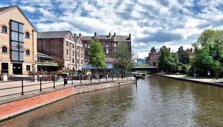 NOTTINGHAM, UK - June 1, 2017: The Castle Wharf area has cafe culture and alfresco dining, all at the water's edge. It is overlooked by Nottingham Castle.のeditorial素材