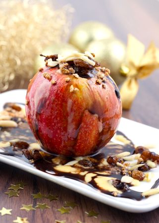 baked apple with chocolate and raisinの写真素材