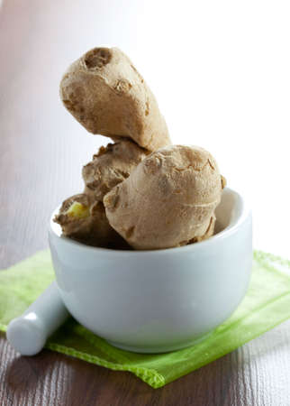 fresh ginger in white bowl 
