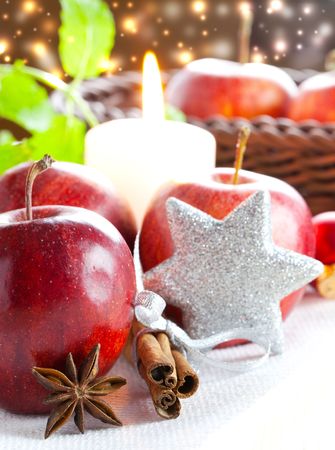apple, cinnamon and anise with christmas decoration の写真素材