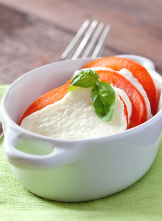 mozzarella with tomato in a bowl の写真素材