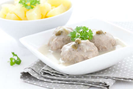 fresh meatballs in caper sauce の写真素材