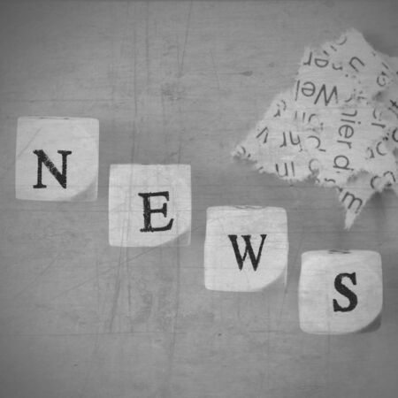 news lettering with paper pieces monochrome の写真素材