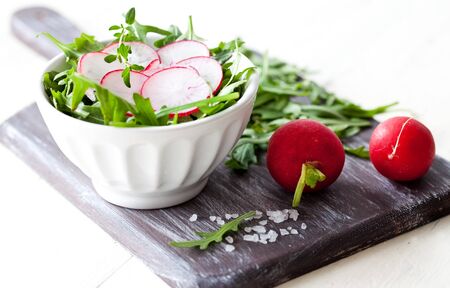 fresh salad with radish and salt の写真素材