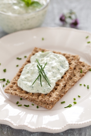 crispbread with chives and curd の写真素材