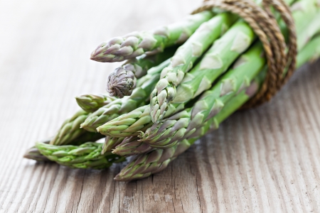 green asparagus on table の写真素材