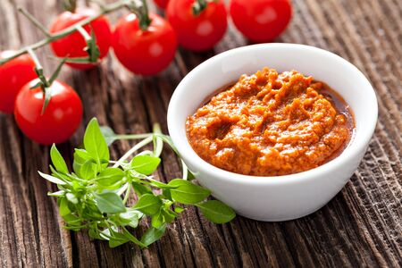 red pesto in a bowl の写真素材