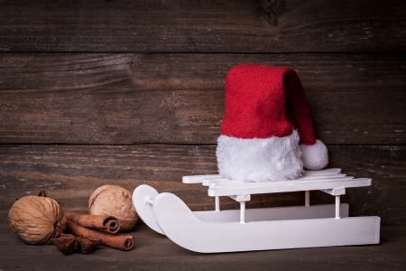 sledge with santas hat and spices  の写真素材
