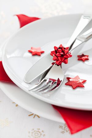place setting with red star shapes の写真素材
