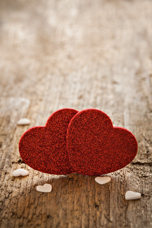 heart shapes on wooden background の写真素材