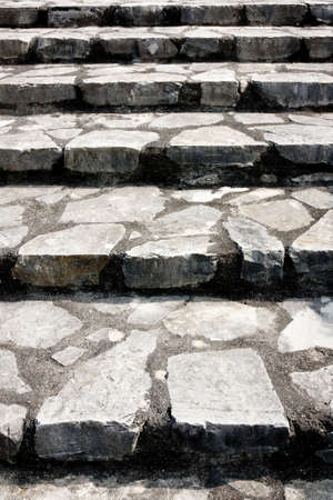 Old stone stairs closeup perspective under sunlightの写真素材