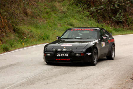LEIRIA, PORTUGAL - APRIL 20: Rui Viana drives a Porsche 944 during Day One of Rally Verde Pino 2012, in Leiria,  Portugal on April 20, 2012.のeditorial素材