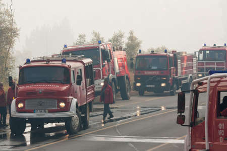 POMBAL, PORTUGAL - JULY 15: Fire Trucks on a road to prevent that wildfire crosses the road, in...