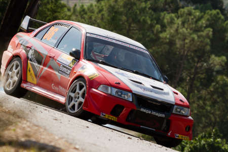 POMBAL, PORTUGAL - SEPTEMBER 22: Paulo Correia drives a Mitsubishi Lancer EVO VI during Rally Centro de Portugal 2012, in Pombal, Portugal on September 22, 2012.のeditorial素材