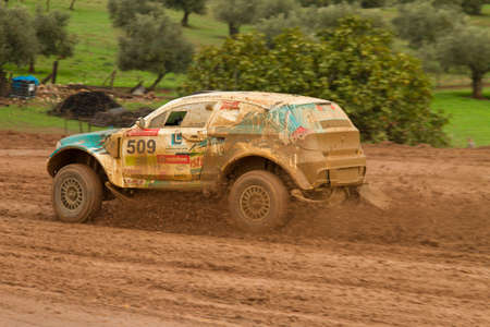 PORTALEGRE, PORTUGAL - NOVEMBER 3: Ricardo Porem drives a Bomcar S1 Proto in BAJA 500, integrated on FIA World Cup for Cross-Country Rallies, in Portalegre, Portugal on November 3, 2012.のeditorial素材