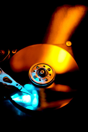 Close up of hard disk drive (HDD) with blue light