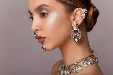 Woman Beauty Portrait, Elegant Fashion Model Hairstyle Makeup. Woman Beauty Portrait, Elegant Fashion Model Hairstyle and Makeup, Jewelery.の写真素材
