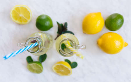 Top view of two jar glasses of homemade lemonadeの写真素材