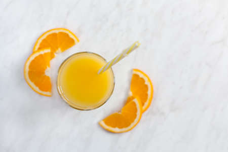 Fresh orange juice and orange with mintの写真素材