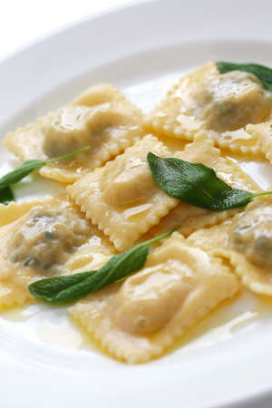 homemade ravioli pasta with sage butter sauce , italian foodの写真素材